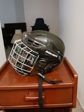 Bauer Black Hockey Helmet with Silver Cage